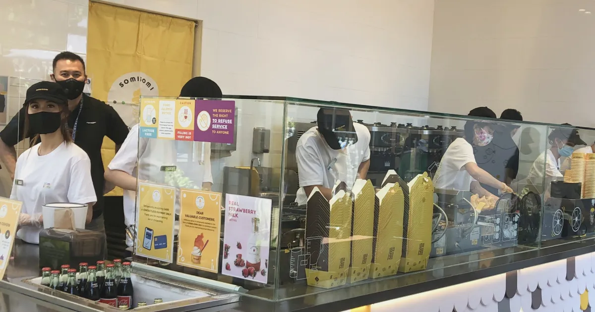 Owner Mark Tran (left in back) employs 14 people in his new Somisomi store in Bella Terra mall. Tran received a SBA 7(a) Community Advantage loan from CDC Small Business Finance to help him finance the opening.