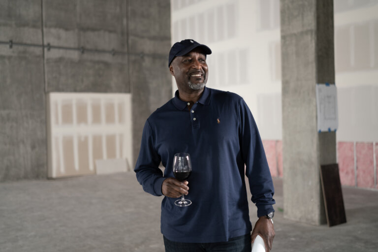 A photo of Earnest Ross, president of California Vintage Wine Bistro, inside his future location in Anaheim.