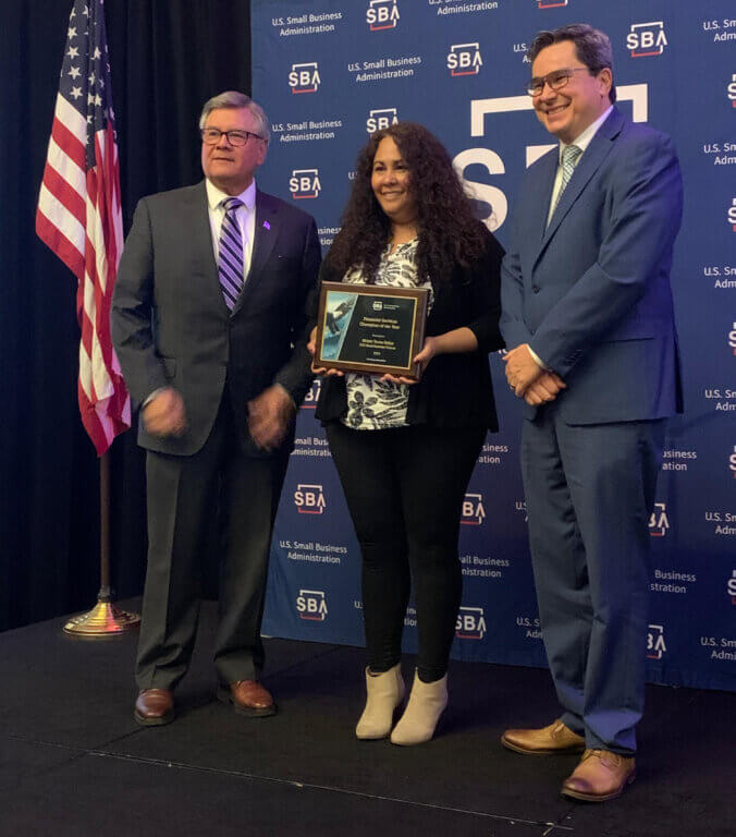 Miriam Torres Baltys, a Senior Small Business Loan Officer with CDC Small Business Finance, is pictured in the middle receiving an award on May 9 fromthe U.S. Small Business Administration’s (SBA) San Diego District Office in its 2023 National Small Business Week Awards.