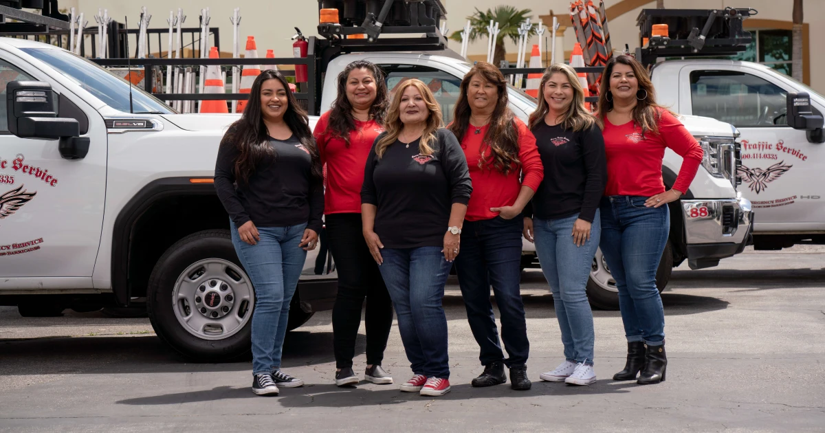 Terry Quinones and crew stand in front of their fleet of traffic control trucks in Camarillo.