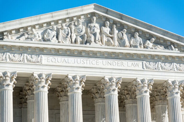 Exterior of Supreme Court showing inscription saying: 'Equal Justice Under Law'