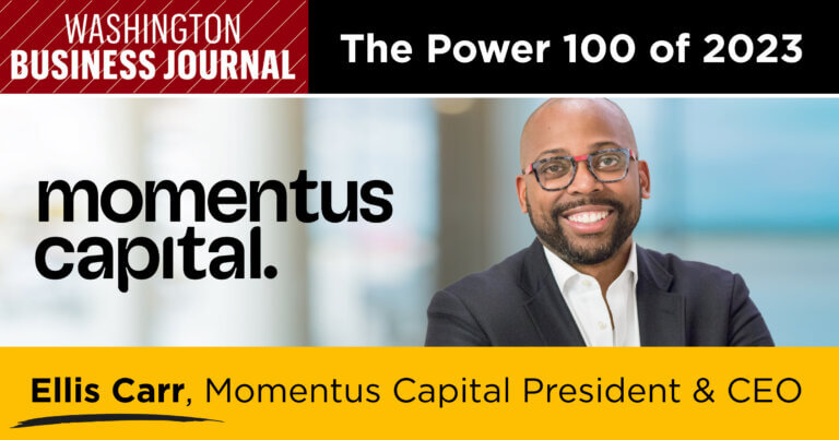 A graphic featuring the logo of the Washington Business Journal, the words "The Power 100 of 2023," the logo for Momentus Capital, a smiling photo of Ellis Carr dressed in a suit with a pair of glasses, and the words "Ellis Carr, Momentus Capital President and CEO."