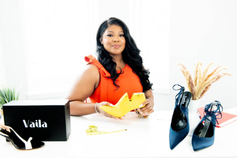 Ahriana Edwards poses with her Vaila shoe collection