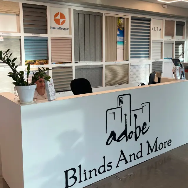 Building interior of Adobe Blinds, a small business in AZ, showing the reception desk.