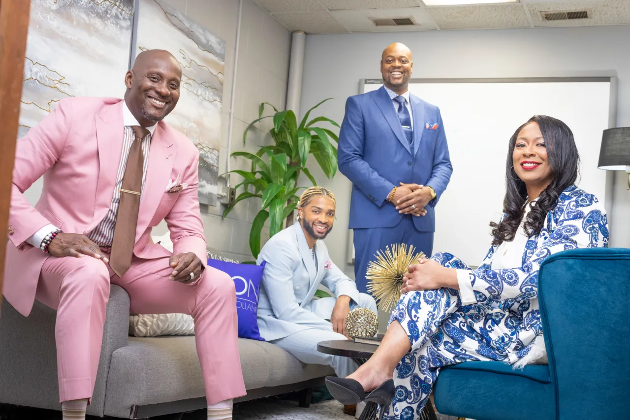 Montee meets with three of his Tayion Collection team after receiving impact investment financing from Momentus Capital.