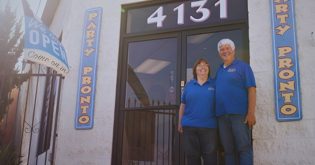 SBA 504 Refinance Rule Changes featured image, borrowers in front of their own building.